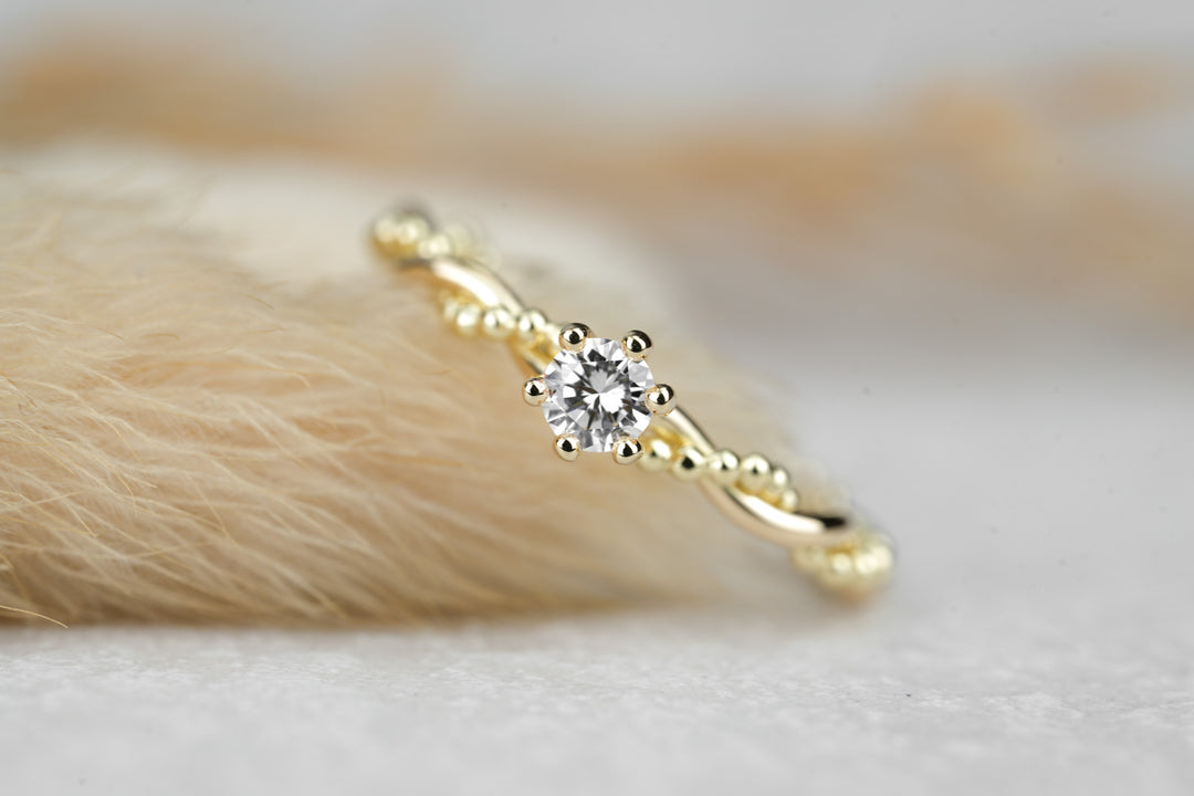 Verlobungsring "Soleil" in Gelbgold mit Diamant