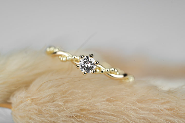 Verlobungsring "Soleil" in Gelbgold mit Diamant