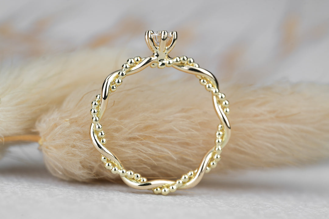 Verlobungsring "Soleil" in Gelbgold mit Diamant