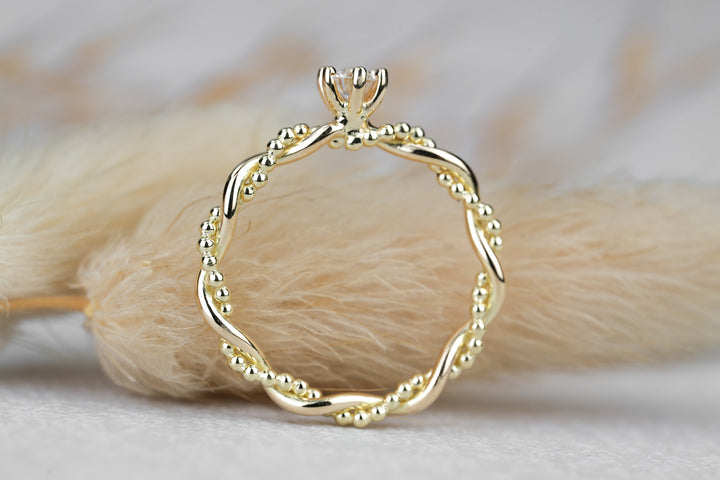 Verlobungsring "Soleil" in Gelbgold mit Diamant