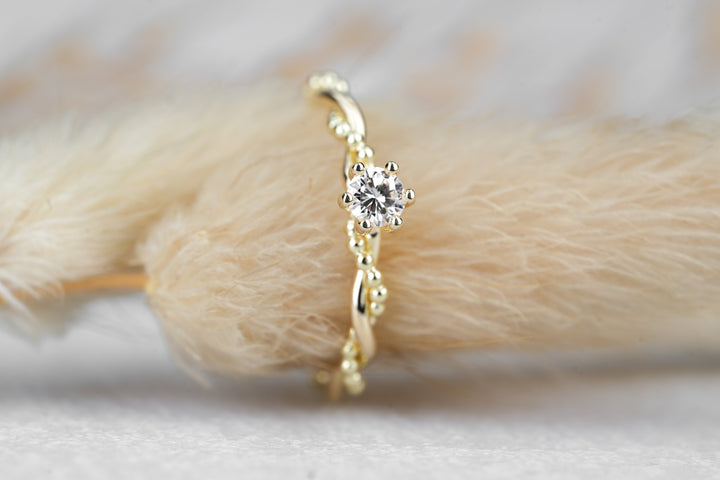 Verlobungsring "Soleil" in Gelbgold mit Diamant