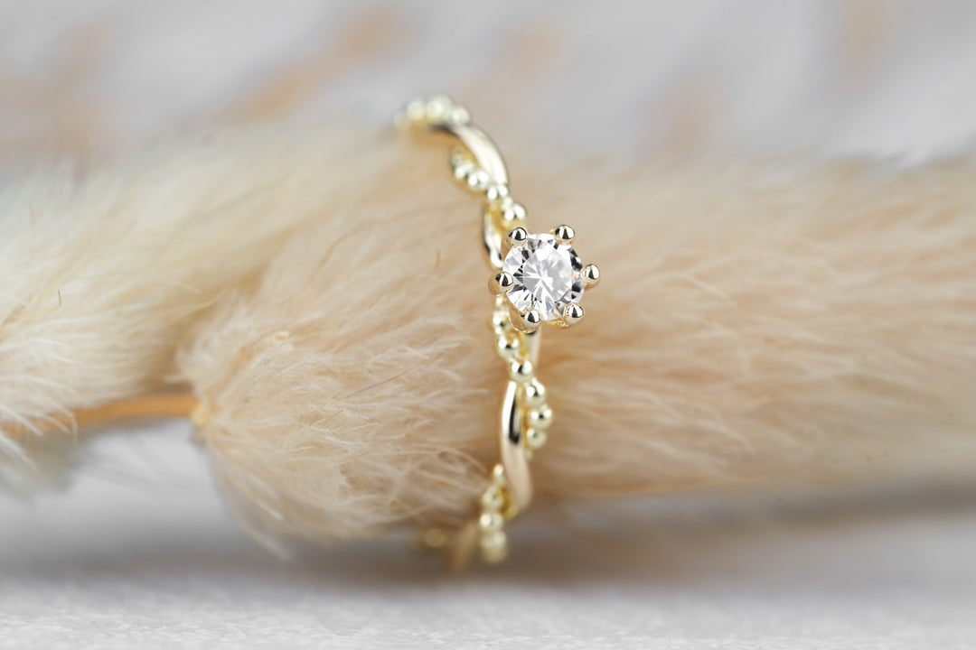 Verlobungsring "Soleil" in Gelbgold mit Diamant