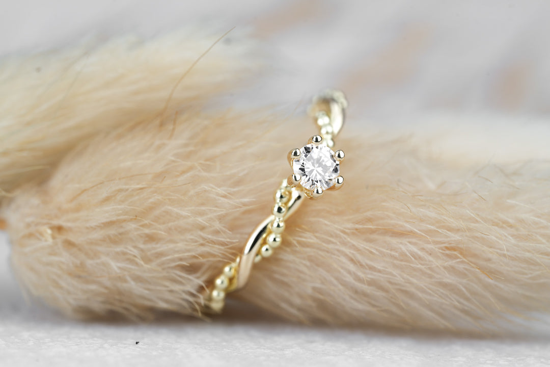 Verlobungsring "Soleil" in Gelbgold mit Diamant